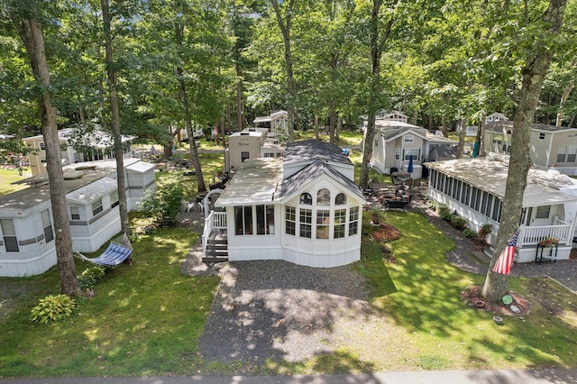 191 Tatnic Rd Unit 74, Wells, ME 04090 - aerial view of property and surrounding area with a tree filled landscape