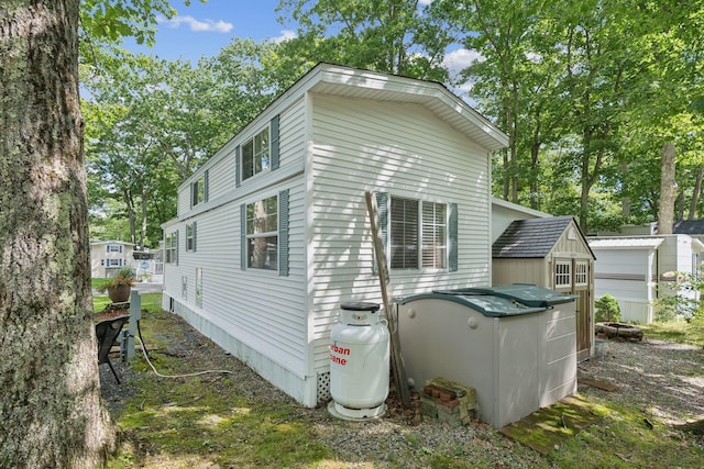 191 Tatnic Rd Unit 74, Wells, ME 04090 - view of side of property with a storage shed