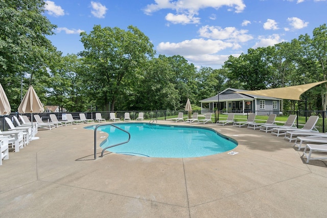 191 Tatnic Rd Unit 74, Wells, ME 04090 - community pool featuring a patio area and view of scattered trees