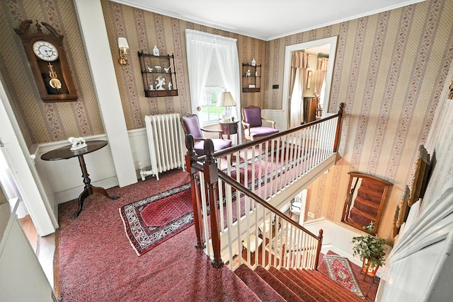 43 Green St, Augusta, ME 04330 - stairs featuring radiator, wallpapered walls, ornamental molding, carpet flooring, and wainscoting