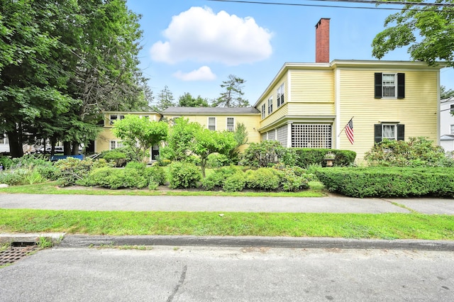 43 Green St, Augusta, ME 04330 - view of front of property featuring a chimney
