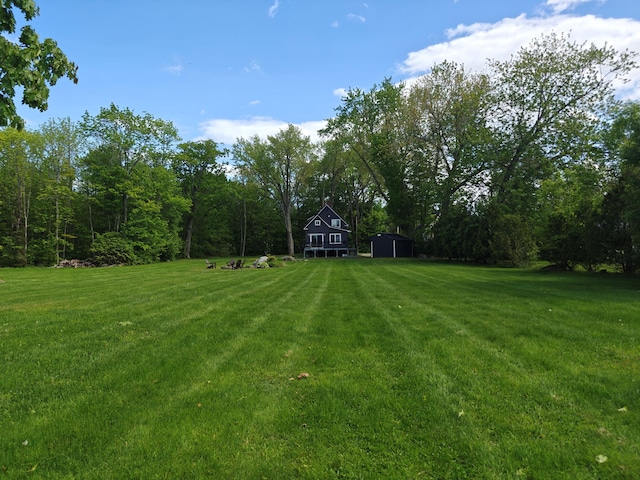 48 Sebasticook Ave, Newport, ME 04953 - view of green lawn with an outdoor structure