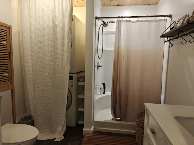 48 Sebasticook Ave, Newport, ME 04953 - full bath with curtained shower, stacked washer / dryer, and vanity