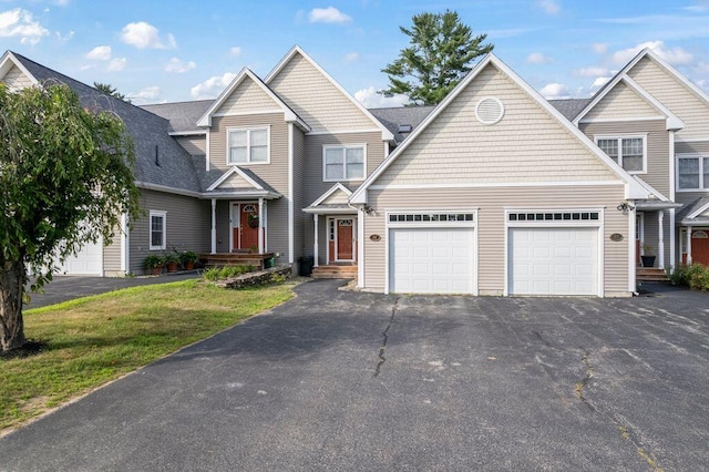 38 Harvest Hill Ln Unit 38, Auburn, ME 04210 - view of front of property featuring driveway and an attached garage