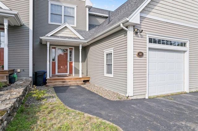 38 Harvest Hill Ln Unit 38, Auburn, ME 04210 - doorway to property featuring a shingled roof