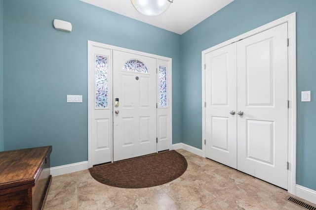 38 Harvest Hill Ln Unit 38, Auburn, ME 04210 - foyer entrance featuring baseboards