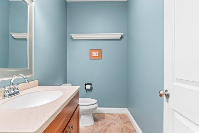 38 Harvest Hill Ln Unit 38, Auburn, ME 04210 - bathroom featuring toilet and vanity