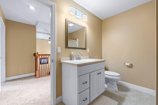 38 Harvest Hill Ln Unit 38, Auburn, ME 04210 - bathroom featuring vanity and a ceiling fan