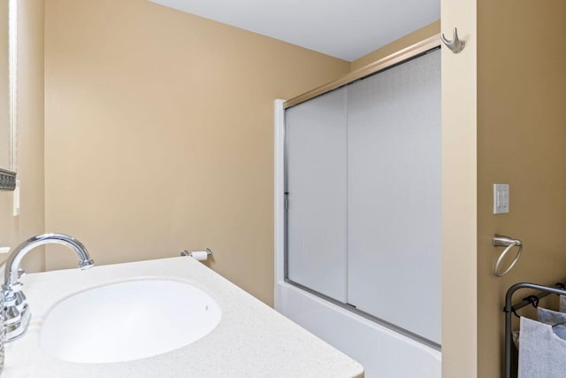 38 Harvest Hill Ln Unit 38, Auburn, ME 04210 - full bath featuring a sink and a shower with door