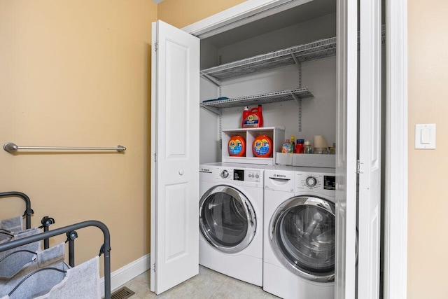 38 Harvest Hill Ln Unit 38, Auburn, ME 04210 - washroom featuring light tile patterned floors and independent washer and dryer