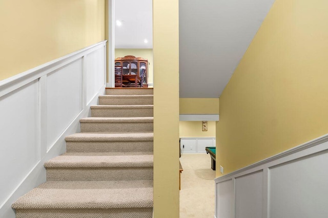 38 Harvest Hill Ln Unit 38, Auburn, ME 04210 - stairs with carpet and a wainscoted wall