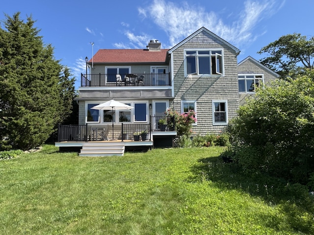 1 Grimes Ave, Boothbay, ME 04544 - back of house featuring a balcony, a yard, a chimney, and a deck