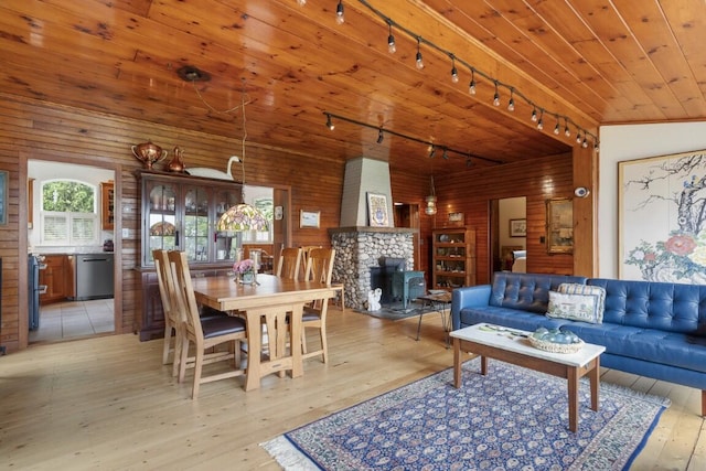 1 Grimes Ave, Boothbay, ME 04544 - living area featuring track lighting, wooden walls, and light wood finished floors