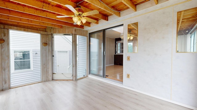 307 Russell St, Lewiston, ME 04240 - unfurnished sunroom featuring beam ceiling