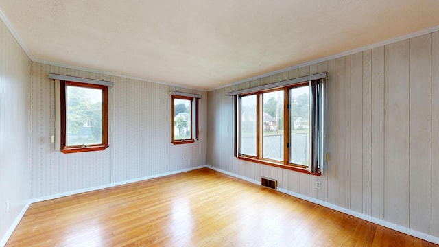 307 Russell St, Lewiston, ME 04240 - unfurnished room featuring wood finished floors and crown molding