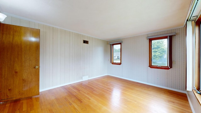 307 Russell St, Lewiston, ME 04240 - unfurnished room with light wood-type flooring and ornamental molding