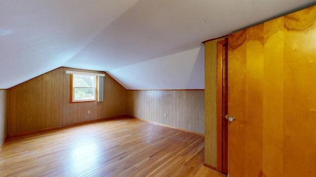 307 Russell St, Lewiston, ME 04240 - bonus room with light wood-style flooring, lofted ceiling, and wooden walls