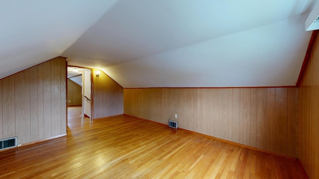307 Russell St, Lewiston, ME 04240 - bonus room featuring wood finished floors, lofted ceiling, and wooden walls