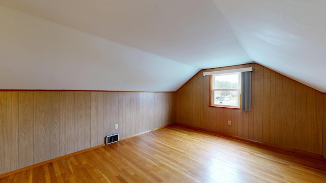 307 Russell St, Lewiston, ME 04240 - additional living space featuring wood finished floors, lofted ceiling, and wood walls