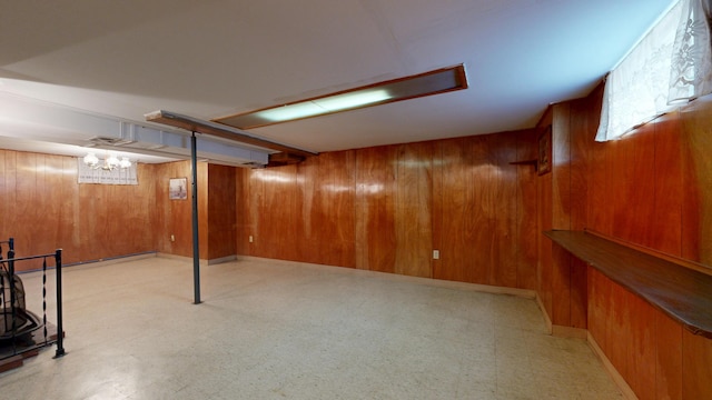 307 Russell St, Lewiston, ME 04240 - finished basement with tile patterned floors and wood walls