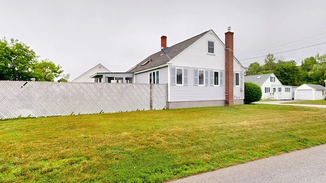 307 Russell St, Lewiston, ME 04240 - view of side of home with a chimney