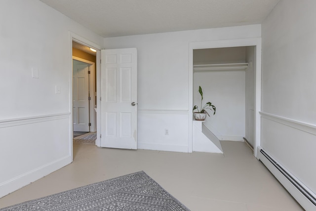 14 Bailey Ln, Brunswick, ME 04011 - unfurnished bedroom with baseboard heating and a closet