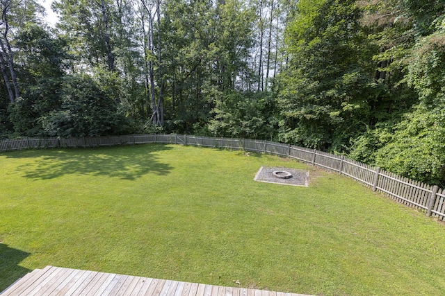 14 Bailey Ln, Brunswick, ME 04011 - fenced backyard featuring a fire pit
