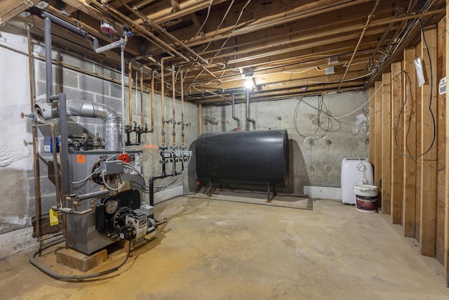 14 Bailey Ln, Brunswick, ME 04011 - unfinished basement with oil tank and a heating unit