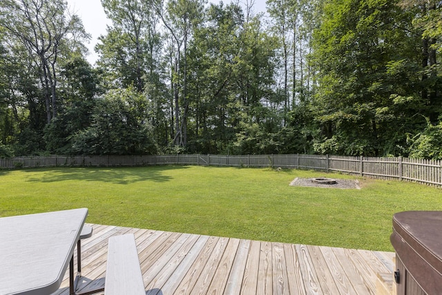 14 Bailey Ln, Brunswick, ME 04011 - fenced backyard with a fire pit, a deck, and view of scattered trees