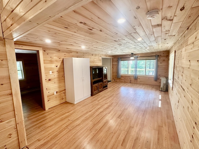 52 Quimby Ln, Fayette, ME 04349 - unfurnished living room featuring wood walls, wood ceiling, and light wood-type flooring