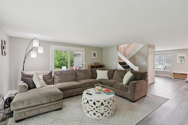 20 Wonderbrook Dr Unit 20, Kennebunk, ME 04043 - living area featuring stairway and wood finished floors