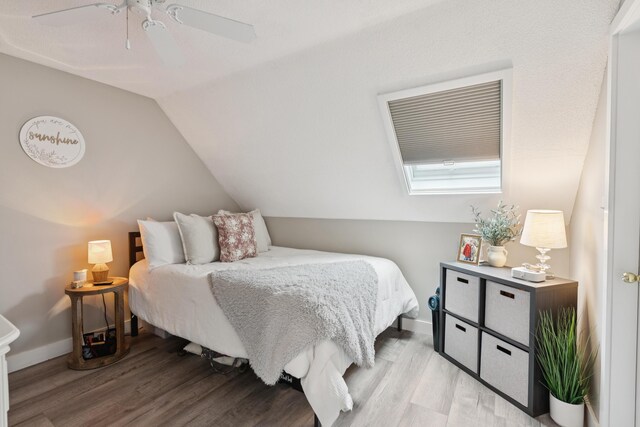 20 Wonderbrook Dr Unit 20, Kennebunk, ME 04043 - bedroom with lofted ceiling, wood finished floors, and a ceiling fan