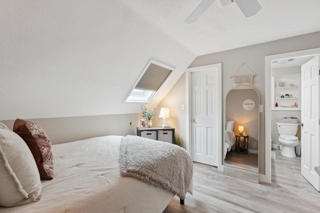 20 Wonderbrook Dr Unit 20, Kennebunk, ME 04043 - bedroom featuring vaulted ceiling, light wood finished floors, and ceiling fan