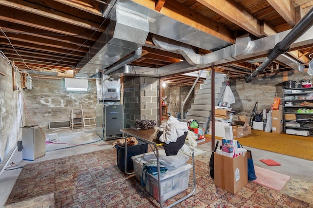 395 Alfred St, Biddeford, ME 04005 - unfinished basement featuring stairway and heating unit