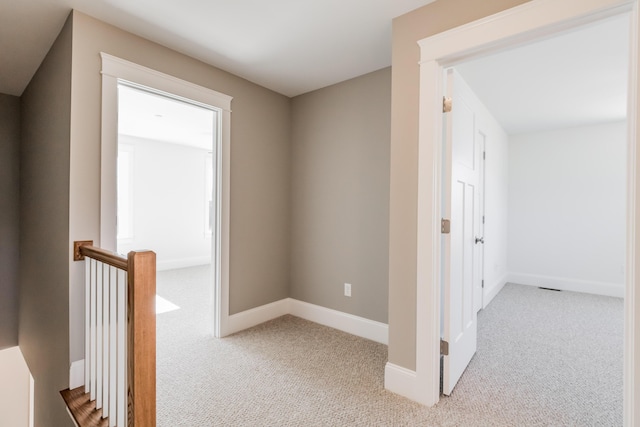 189 Falcon Crest Dr Unit 31, Gorham, ME 04038 - hall with carpet floors and an upstairs landing