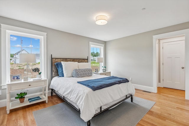 189 Falcon Crest Dr Unit 31, Gorham, ME 04038 - bedroom featuring light wood-type flooring and baseboards