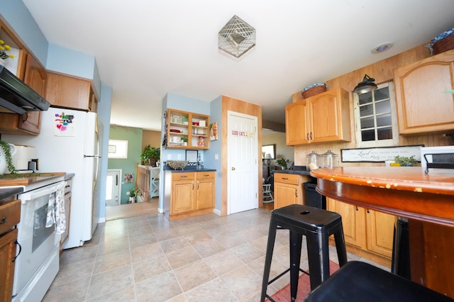 3922 Union St, Levant, ME 04456 - kitchen with white appliances, light brown cabinets, dark countertops, and open shelves