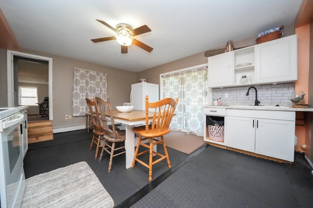 3922 Union St, Levant, ME 04456 - dining area with ceiling fan and a baseboard radiator