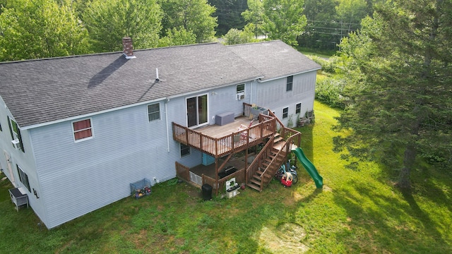 3922 Union St, Levant, ME 04456 - rear view of house featuring roof with shingles, a wooden deck, a chimney, and a yard