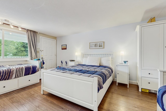 76 Post Rd Unit 17M & 18M, Wells, ME 04090 - bedroom featuring light wood-style flooring