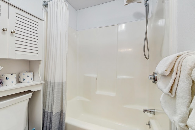 76 Post Rd Unit 17M & 18M, Wells, ME 04090 - bathroom with shower / tub combo with curtain and toilet
