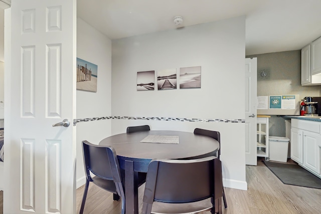 76 Post Rd Unit 17M & 18M, Wells, ME 04090 - dining room featuring light wood-style floors