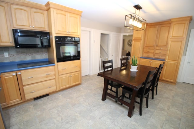 6 Shirley Ave, Lewiston, ME 04240 - dining space with a chandelier