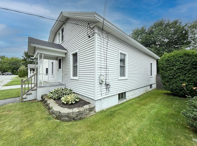 6 Shirley Ave, Lewiston, ME 04240 - view of home's exterior with a lawn