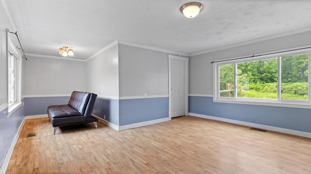 2300 Hudson Rd, Hudson, ME 04449 - unfurnished room with wood finished floors and ornamental molding