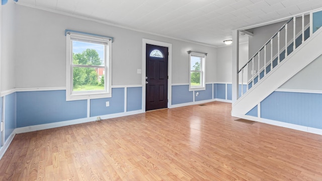2300 Hudson Rd, Hudson, ME 04449 - entrance foyer with crown molding, stairs, and wood finished floors