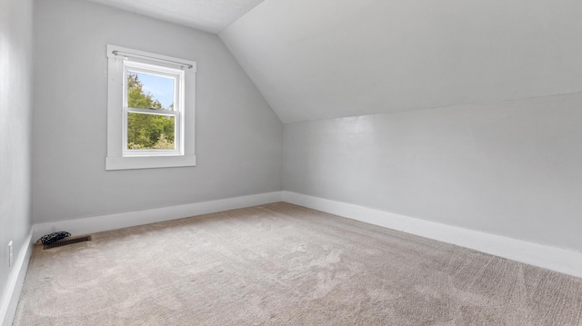2300 Hudson Rd, Hudson, ME 04449 - additional living space featuring vaulted ceiling and carpet floors