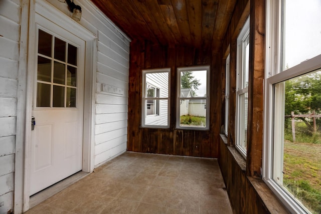 2300 Hudson Rd, Hudson, ME 04449 - unfurnished sunroom featuring wood walls and wooden ceiling