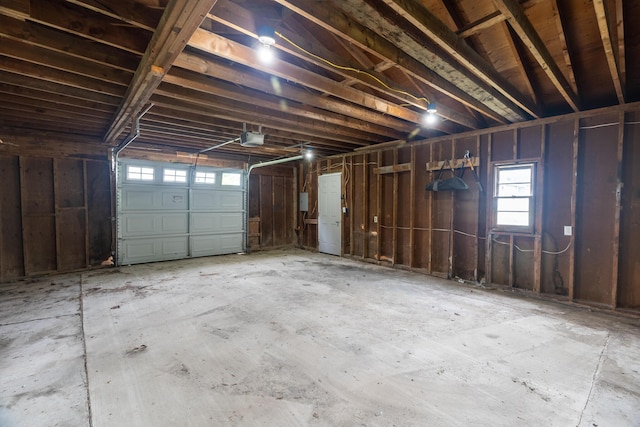 2300 Hudson Rd, Hudson, ME 04449 - garage with a garage door opener