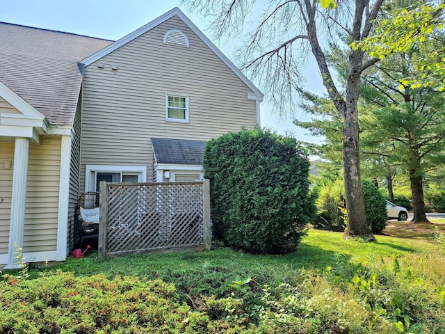 46 Glenridge Dr Unit 46, Portland, ME 04102 - view of side of property featuring a shingled roof